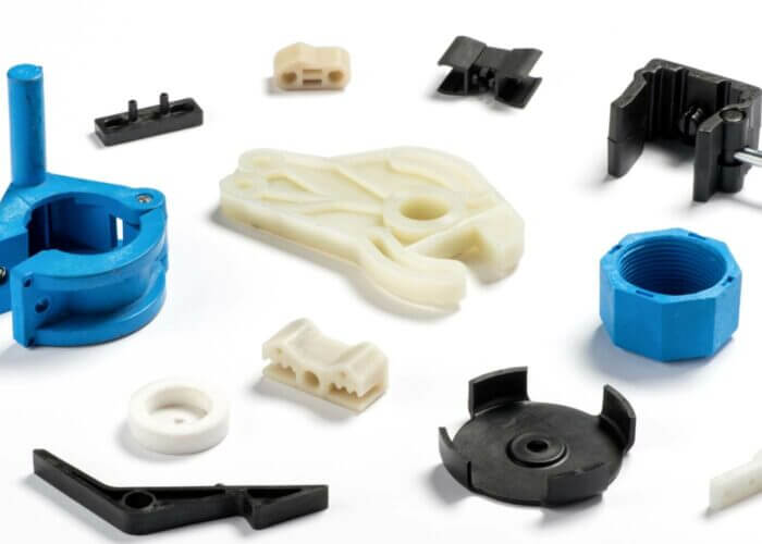 An array of injection-molded plastic parts